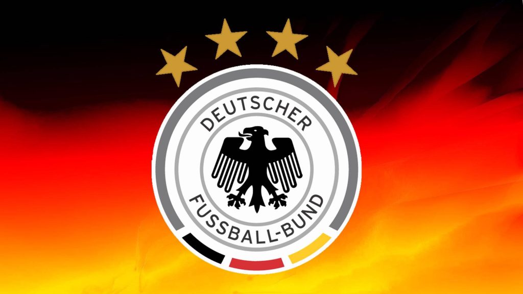 Germany National Football Team crest with eagle and stars on fiery red orange abstract background Wallpaper