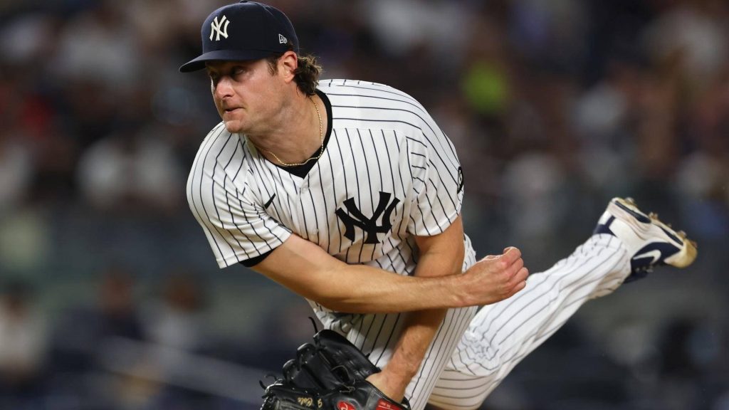 Gerrit Cole pitching for New York Yankees in iconic pinstripe uniform dynamic MLB wallpaper