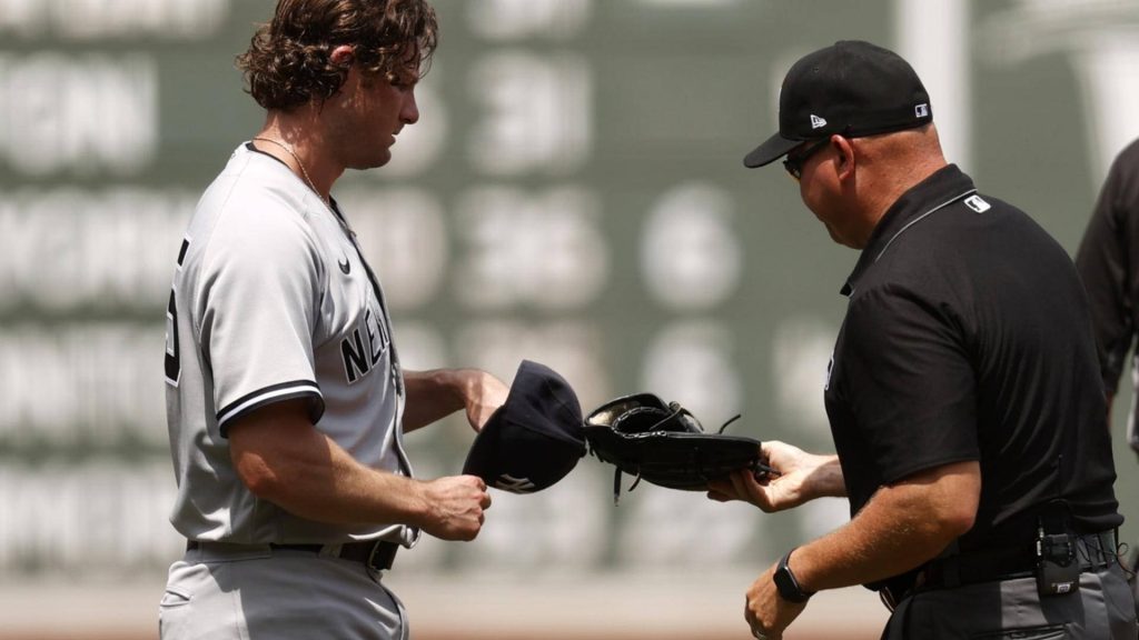 New York Yankees pitcher Gerrit Cole hands cap to umpire for foreign substance check MLB wallpaper