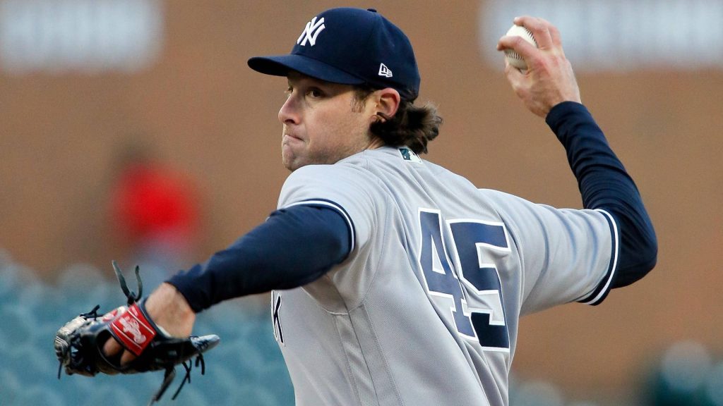 Gerrit Cole pitching in New York Yankees grey uniform number 45 MLB baseball action wallpaper