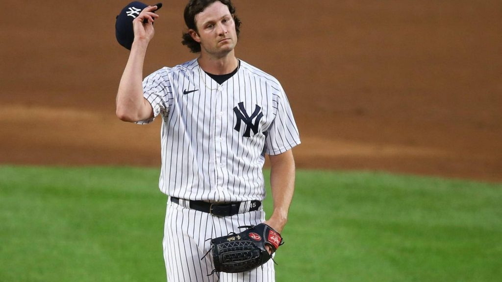 Gerrit Cole New York Yankees ace tipping cap in pinstripes realistic baseball wallpaper