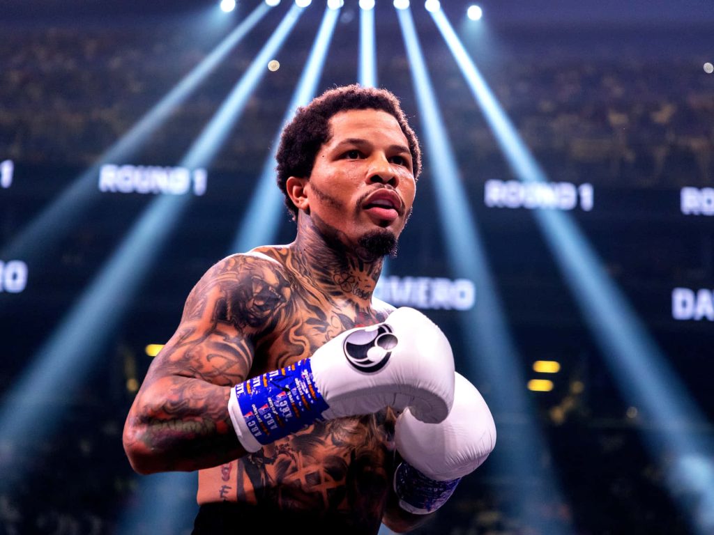Gervonta Davis intense boxing moment round 1 arena lights white gloves signature tattoos wallpaper