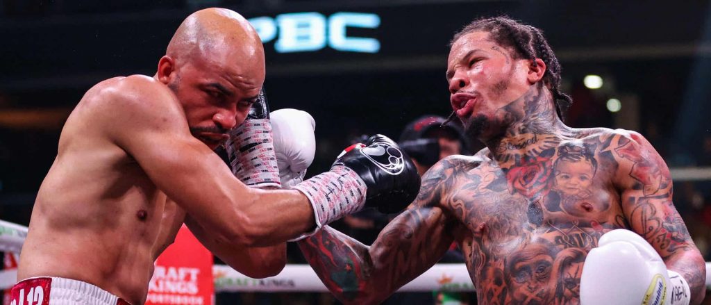 Gervonta Tank Davis and Hector Luis Garcia intense boxing match high action PBC fight wallpaper