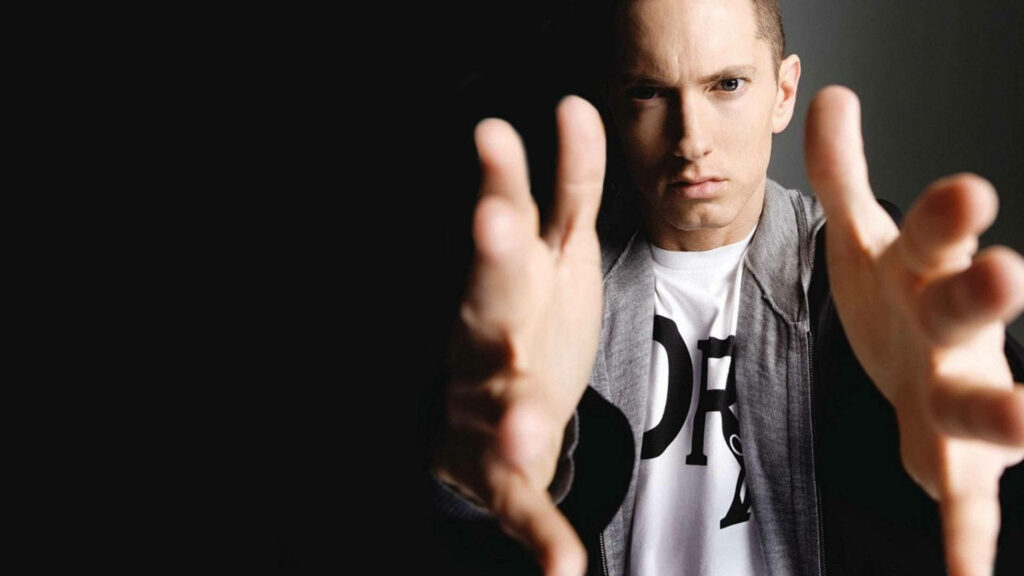 Raising the Bar: Eminem's Powerful Presence in American Rap - Wallpaper