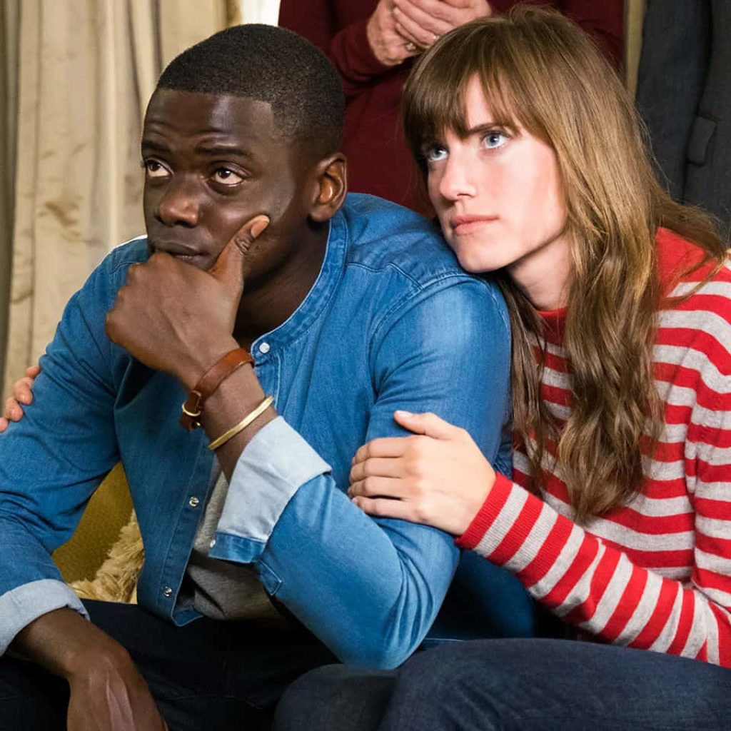 Get Out wallpaper with Daniel Kaluuya as Chris and Allison Williams as Rose in tense scene