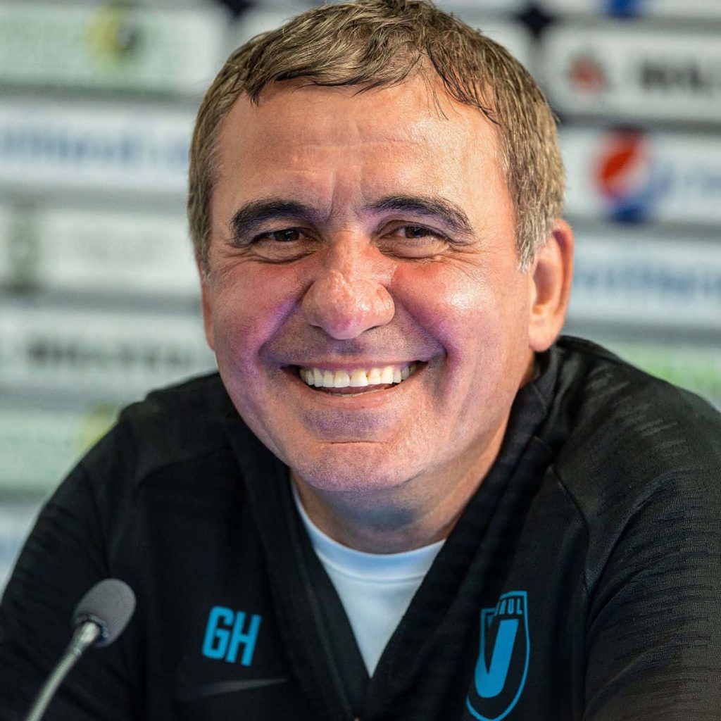 Portrait of Romanian football manager Gheorghe Hagi smiling in Farul Constanța training top Wallpaper
