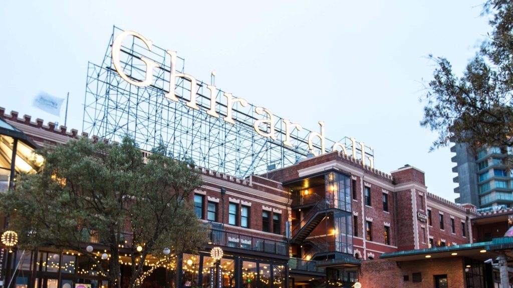 Ghirardelli Square wallpaper San Francisco dusk glowing sign historic red brick building