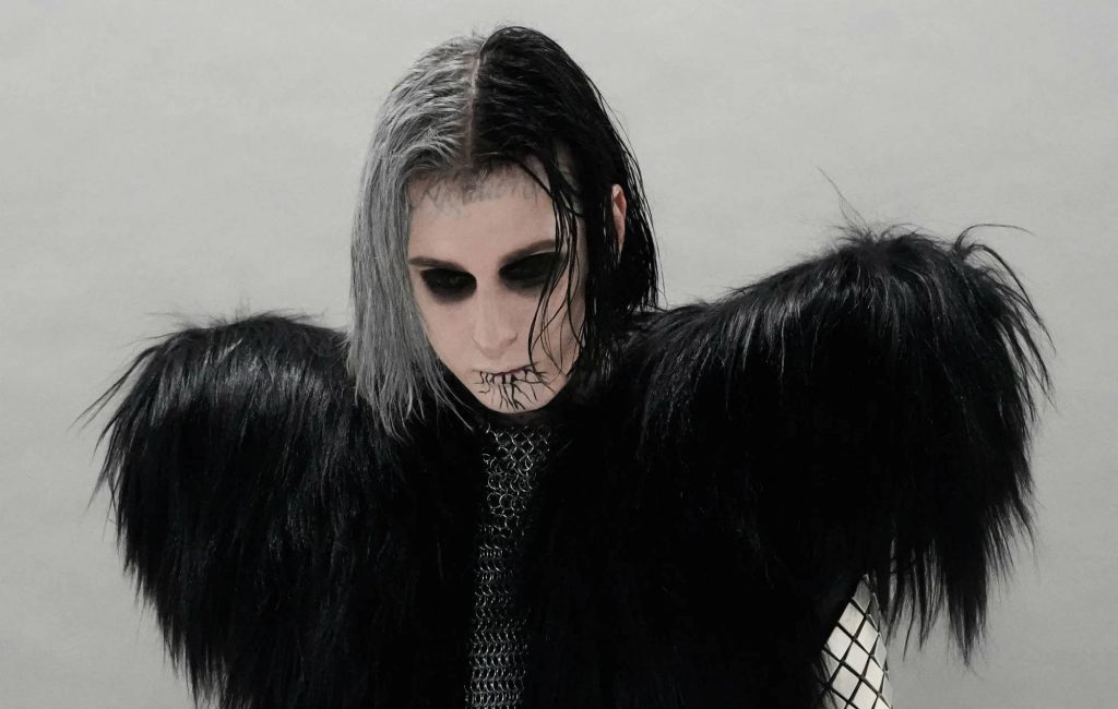 Ghostemane gothic industrial portrait with split hair metallic chainmail and black fur shrug Wallpaper
