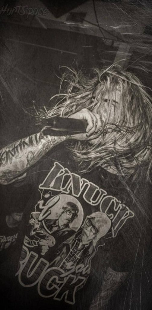 Ghostemane intense live performance black and white wallpaper with long hair tattoos background