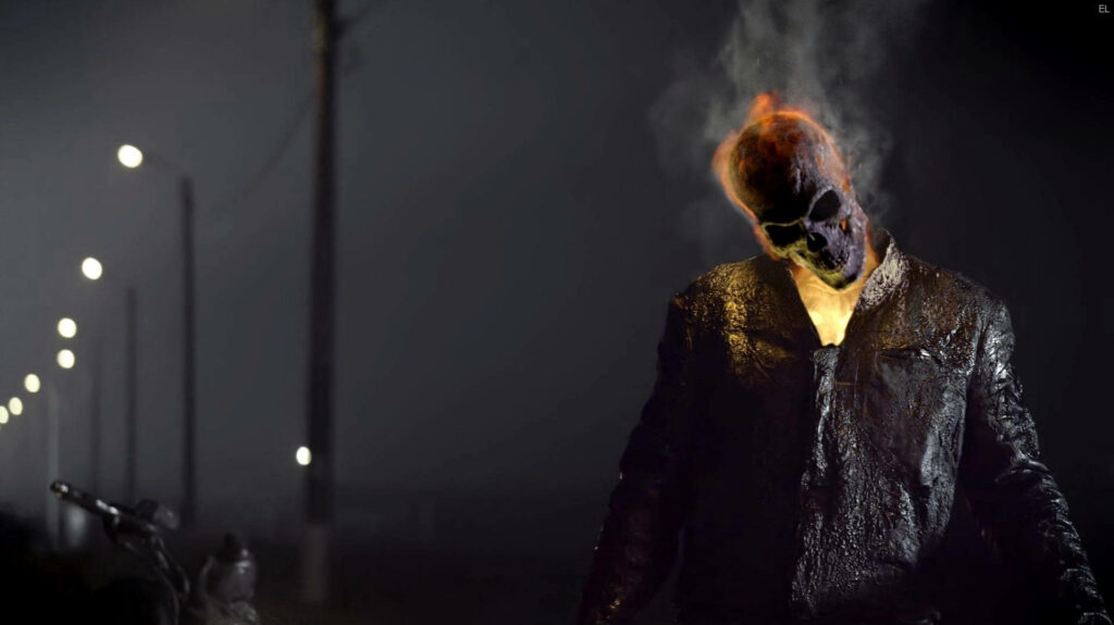 The Sinister Specter: Ghost Rider's Smoking Skeleton Haunting a Moonless Night Wallpaper