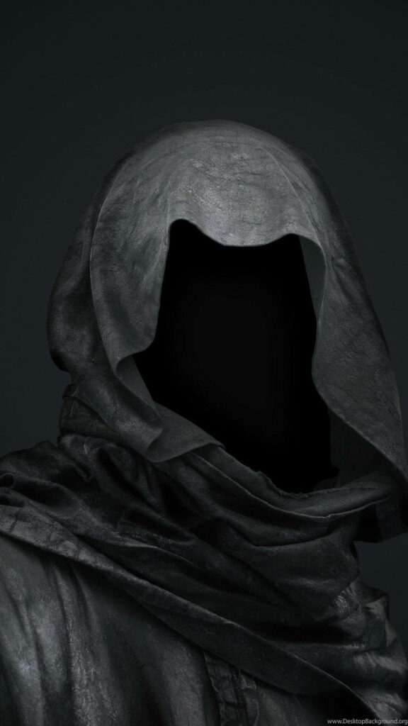 Ghostly hooded figure with a dark cloak and void face on eerie shadowy background wallpaper