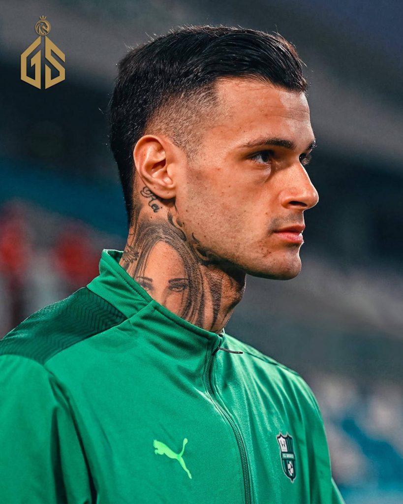 Gianluca Scamacca close-up wearing green Puma jacket showing neck tattoos football wallpaper
