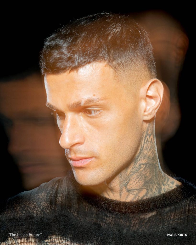 High contrast close-up portrait of Italian footballer Gianluca Scamacca with neck tattoo Wallpaper