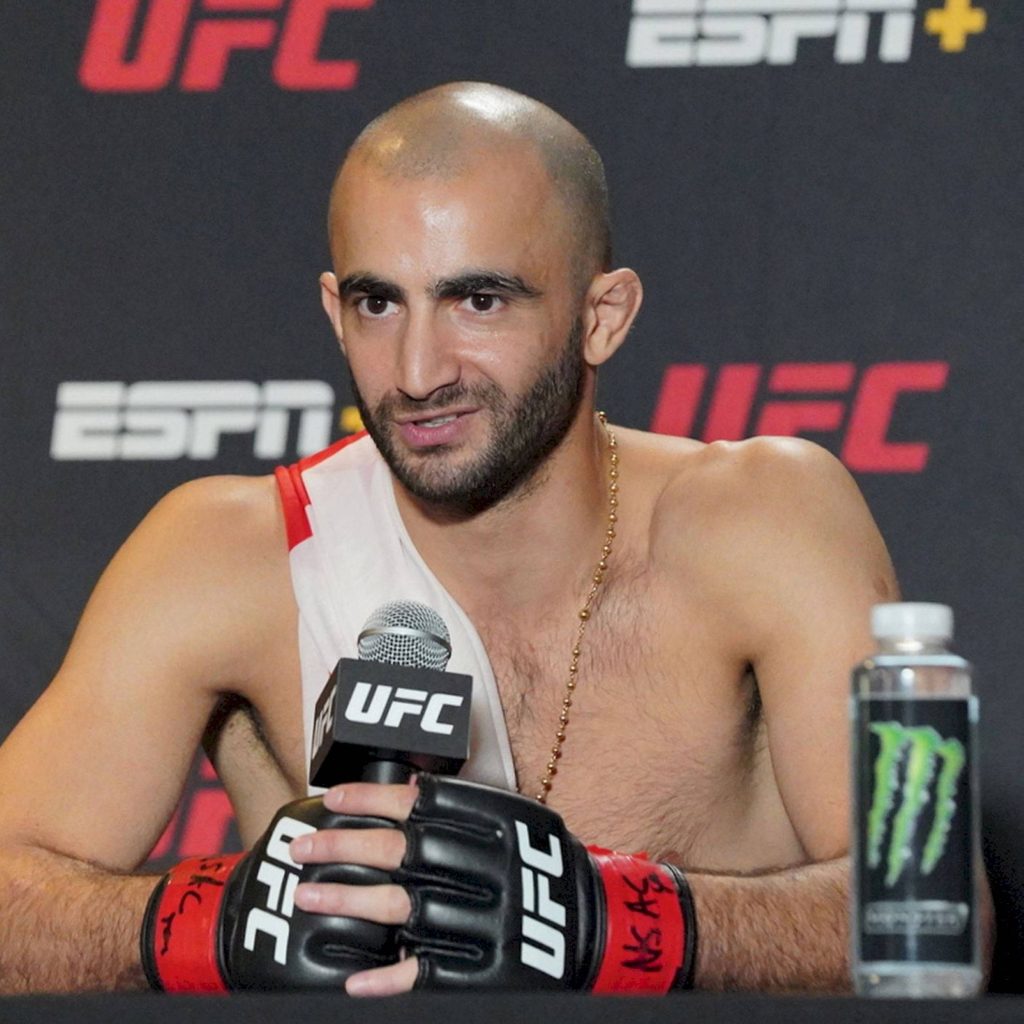 UFC fighter Giga Chikadze shirtless with gloves Georgian flag UFC ESPN backdrop wallpaper