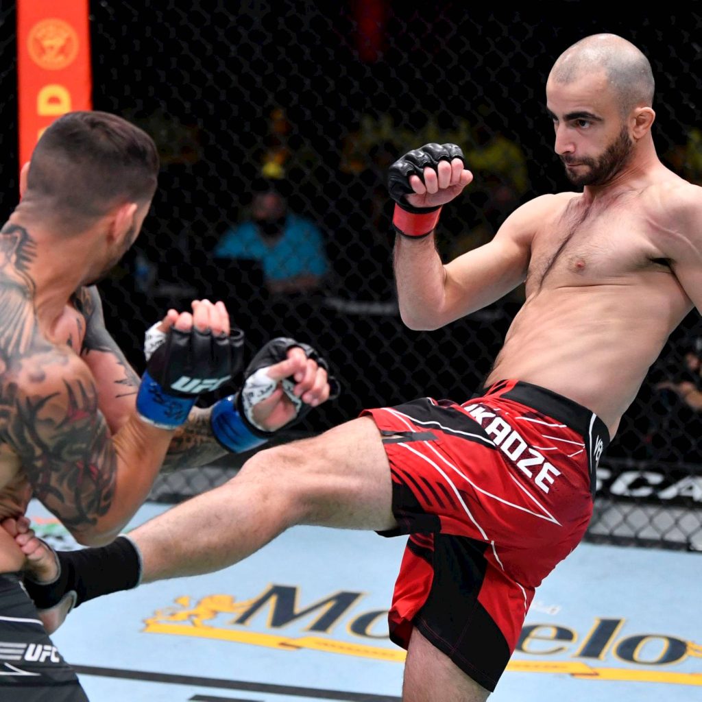 Giga Chikadze UFC fight high kick inside Octagon intense MMA striker wallpaper background