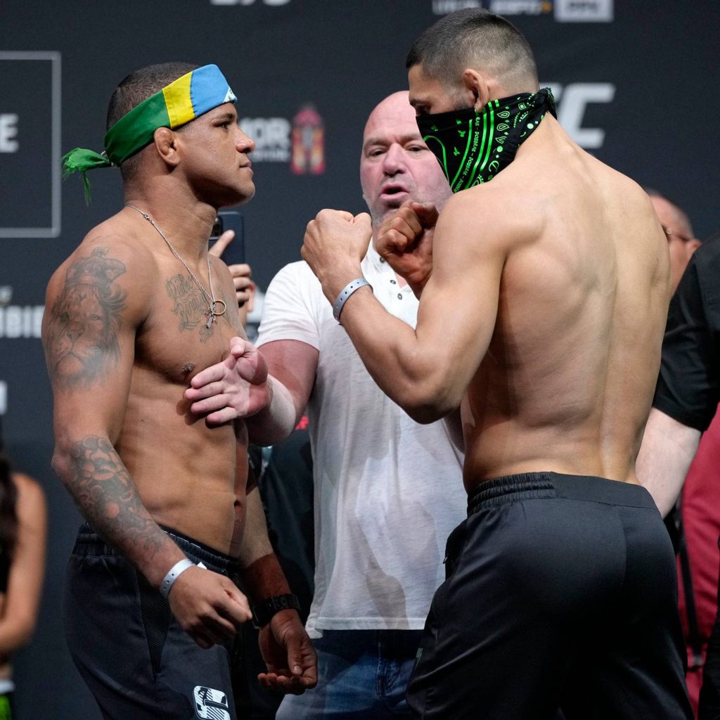 UFC weigh-in intense face-off Gilbert Burns versus Khamzat Chimaev with Dana White background Wallpaper