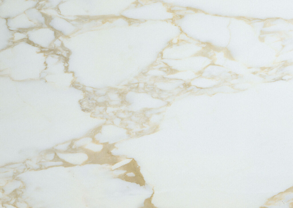 Glamorous Gold Veins Flowing Through White Marble: A Captivating Golden Marble Background Wallpaper
