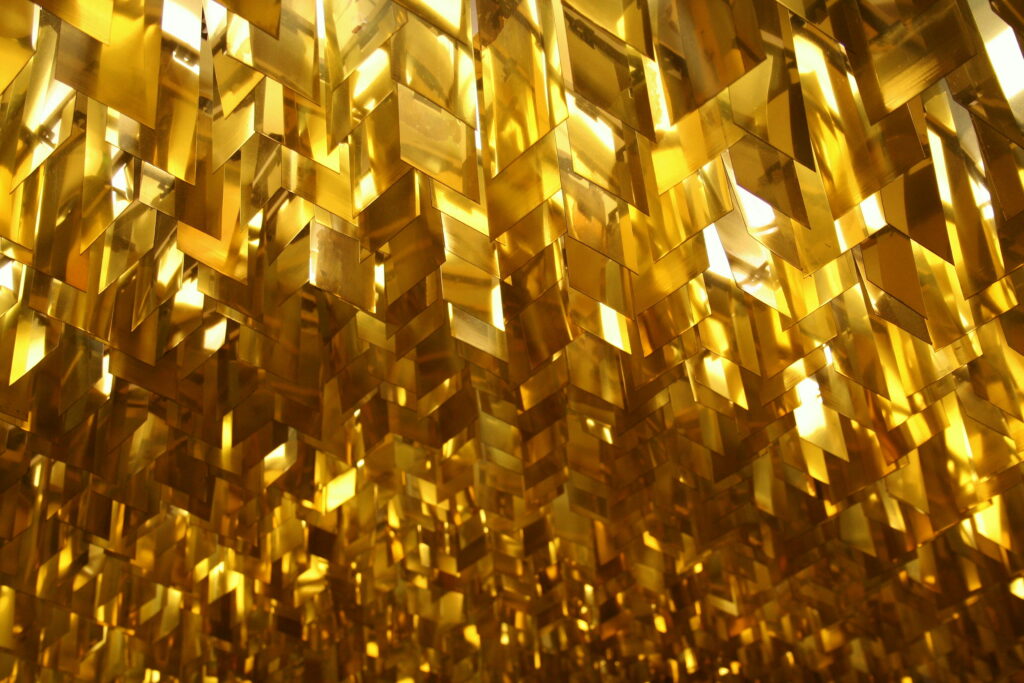 Dazzling Gold Elegance: A Luxurious Crystal Ceiling Fixture Shining in Clear Radiance Wallpaper