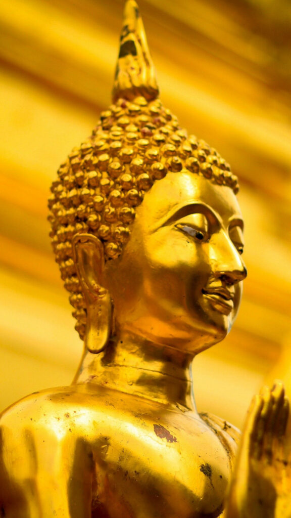 The Radiant Splendor: A Mesmerizing Buddha 3D Background Immersed in Golden Brilliance Wallpaper