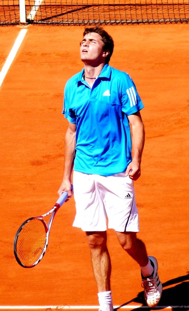 Gilles Simon intense clay tennis match reflection blue Adidas shirt professional player wallpaper