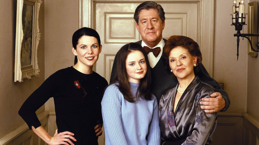 Gilmore Girls family portrait with Lorelai Rory Richard and Emily in warm elegant setting Wallpaper