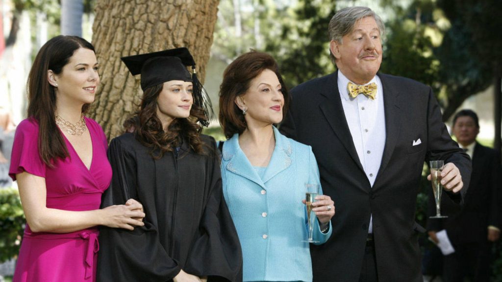 Gilmore Girls graduation wallpaper featuring Lorelai Rory Emily and Richard outdoor celebration