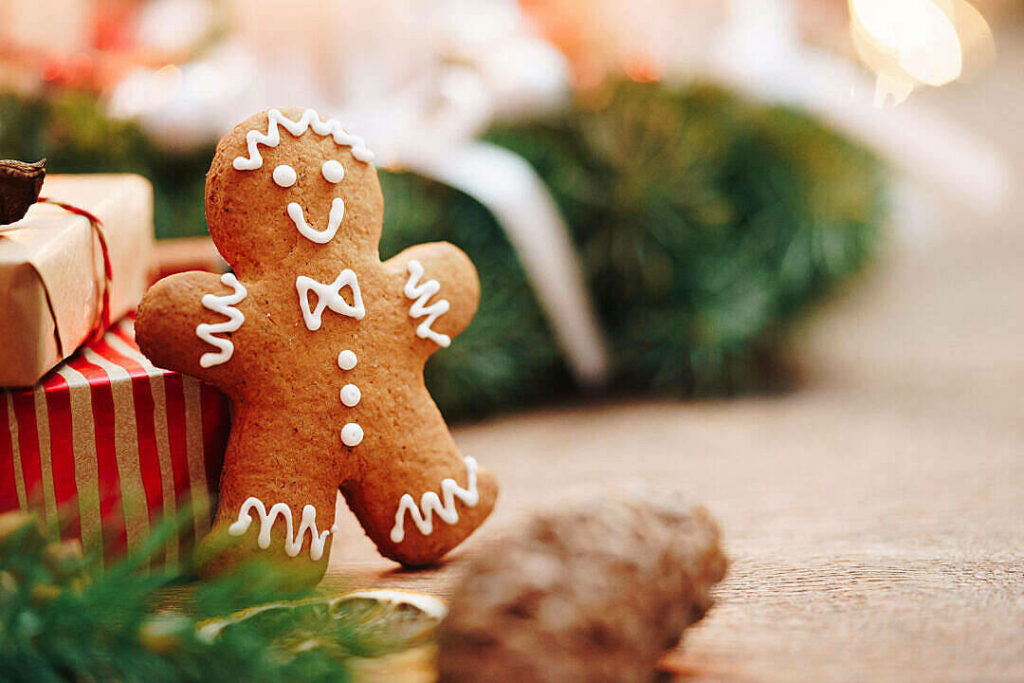 Gingerbread Delights: Festive Holiday Desktop with Giftbox Magic Wallpaper