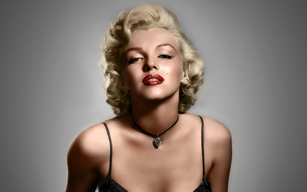 Glamorous Marilyn Monroe portrait with blonde curls red lips classic Hollywood style wallpaper
