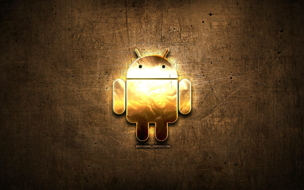 Shimmering Gold Android Emblem Radiating on Metallic Brown Desktop: A Marvelous Android Desktop Wallpaper
