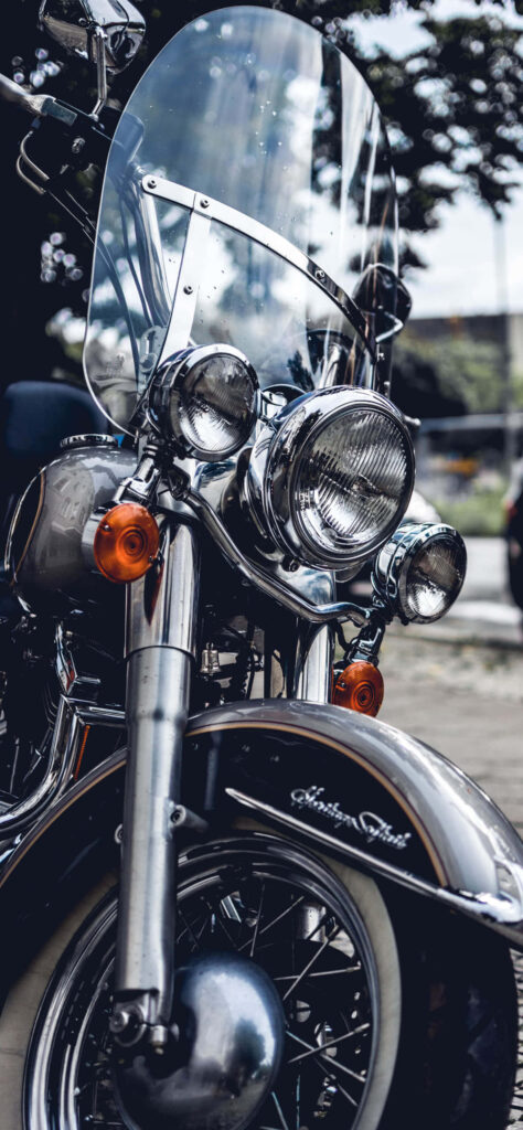 Gleaming Harley-Davidson Heritage Softail Wallpaper: Classic Chrome Detail