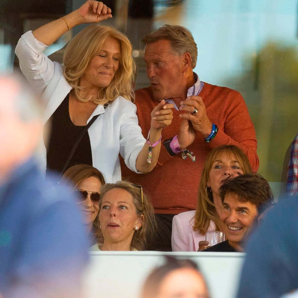 Glenn Hoddle Brenda and Tom Cruise VIP box at sporting event bright social atmosphere wallpaper