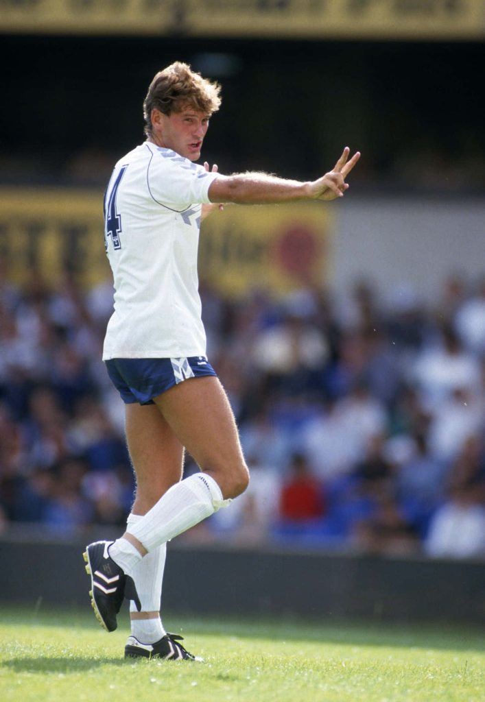Glenn Hoddle in classic white kit focused on football pitch during competitive match wallpaper