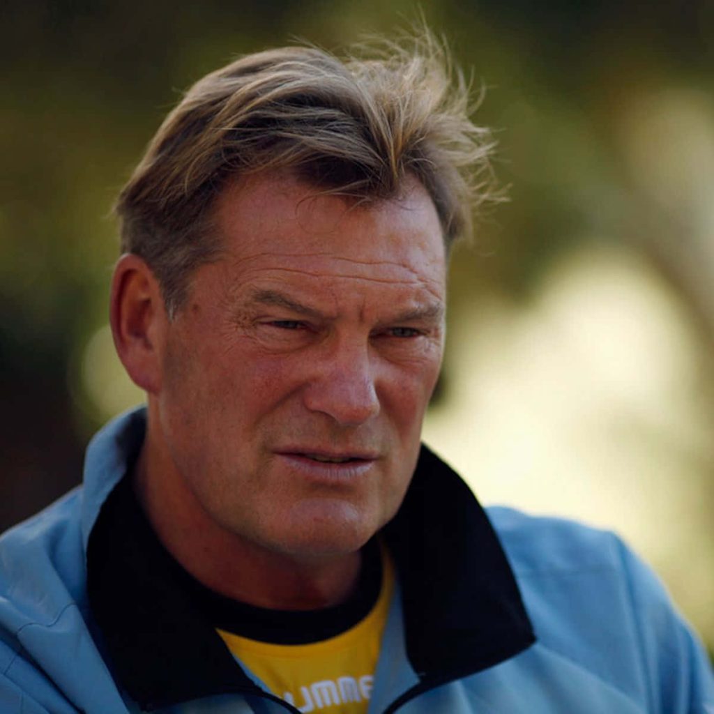 Glenn Hoddle in blue yellow Hummel jacket outdoor portrait natural light soft-focus background Wallpaper