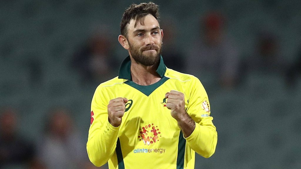 Glenn Maxwell celebrating in Australian gold and green cricket jersey intense action wallpaper