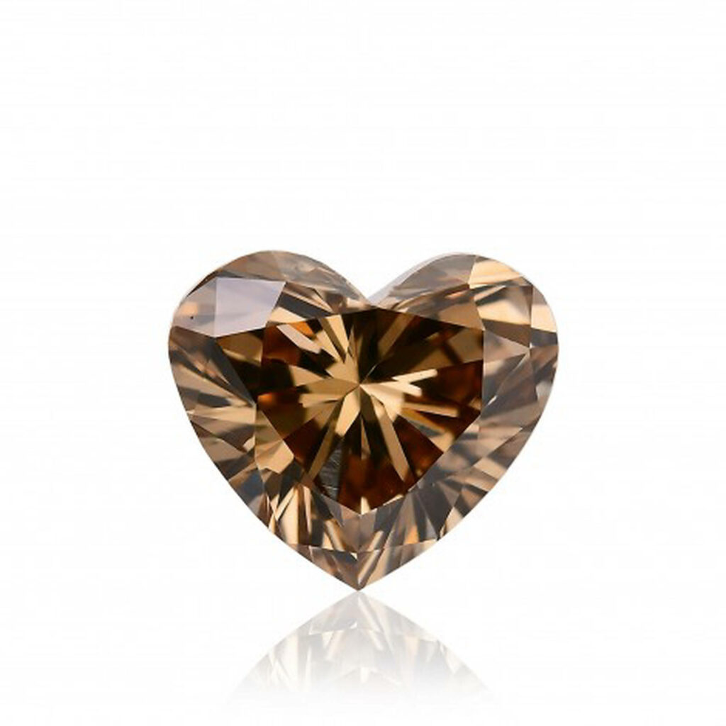 Gleaming Radiance: The Enchanting Splendor of a Brown Heart Gem on a Luxurious Background Wallpaper
