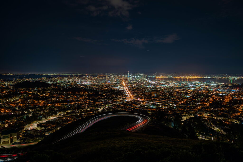 San Francisco Illuminated: A Captivating Aerial Overview of the Vibrant Night Cityscape Wallpaper