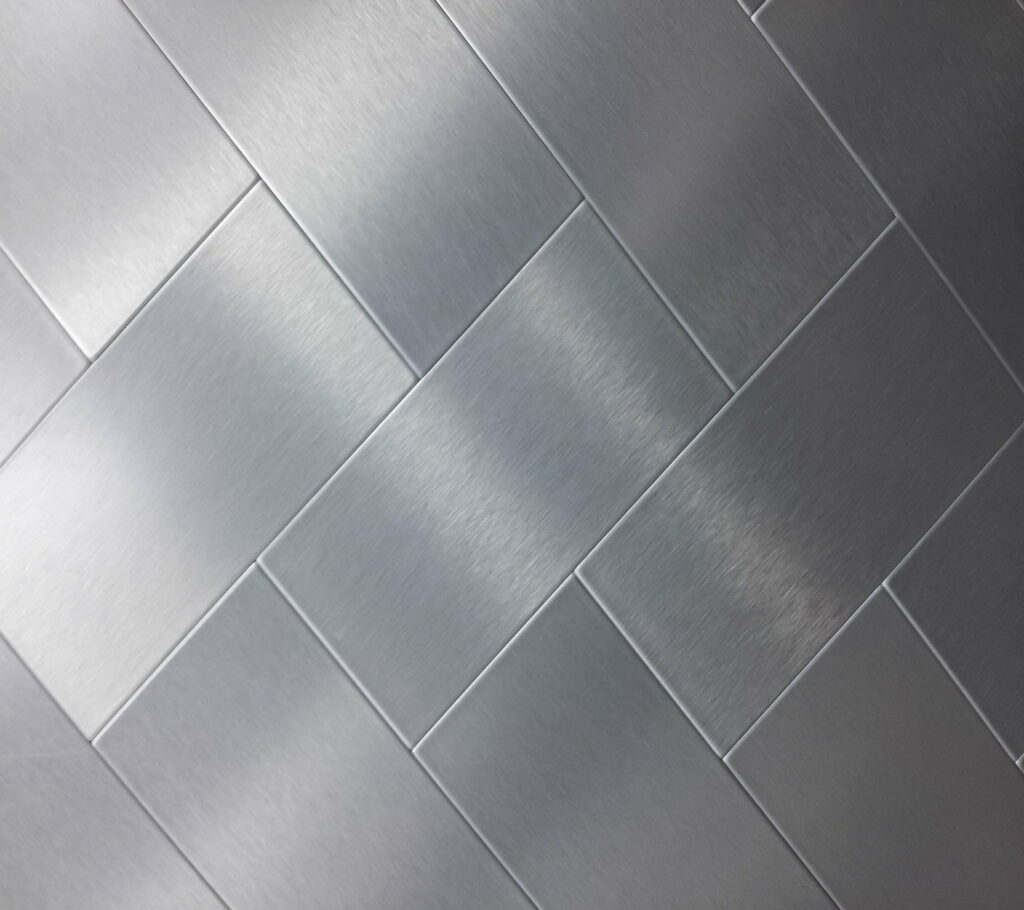 Shimmering Elegance: A High-Definition Silver Textured Wallpaper Background