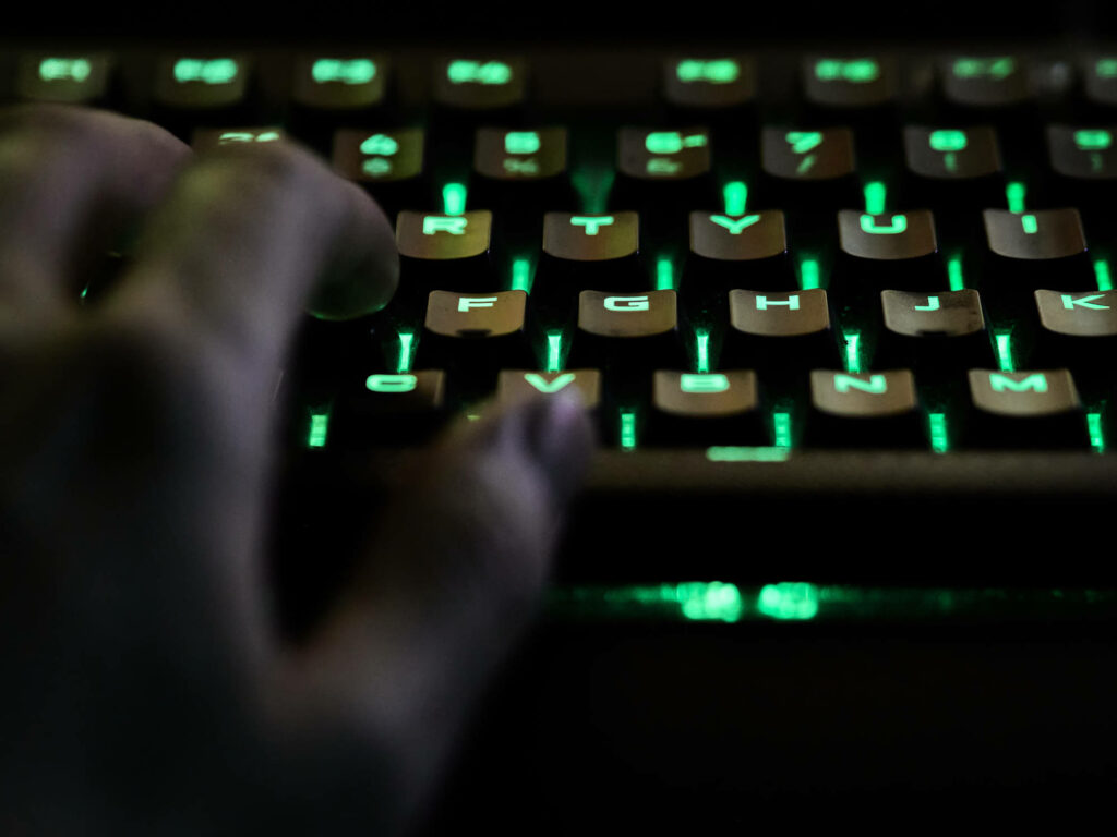 Glowing in Mint: Captivating Neon Light Enhances Computer Keyboard Backdrop Wallpaper