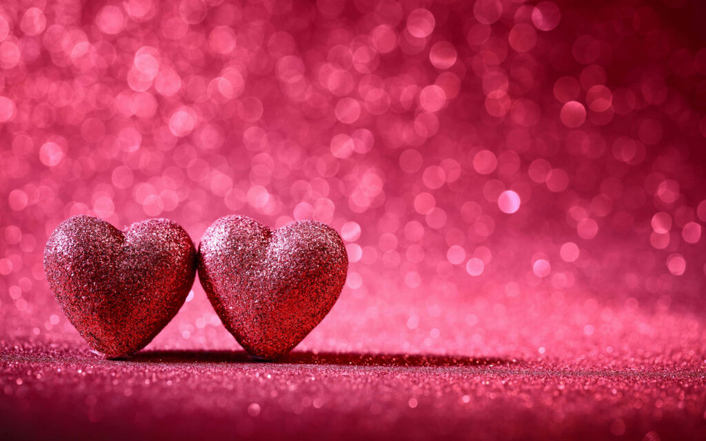 Romantic Pink Hearts Wallpaper Background for a Feminine Touch