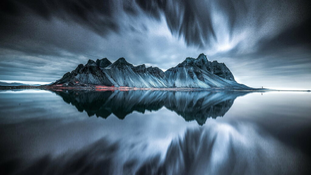 Vestrahorn mountain Iceland reflection calm waters stormy sky dramatic landscape wallpaper