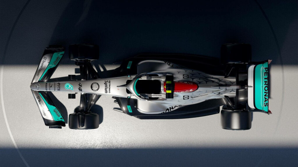 Unveiling the Champion: Lewis Hamilton's Mercedes F1 Car in the Spotlight Wallpaper