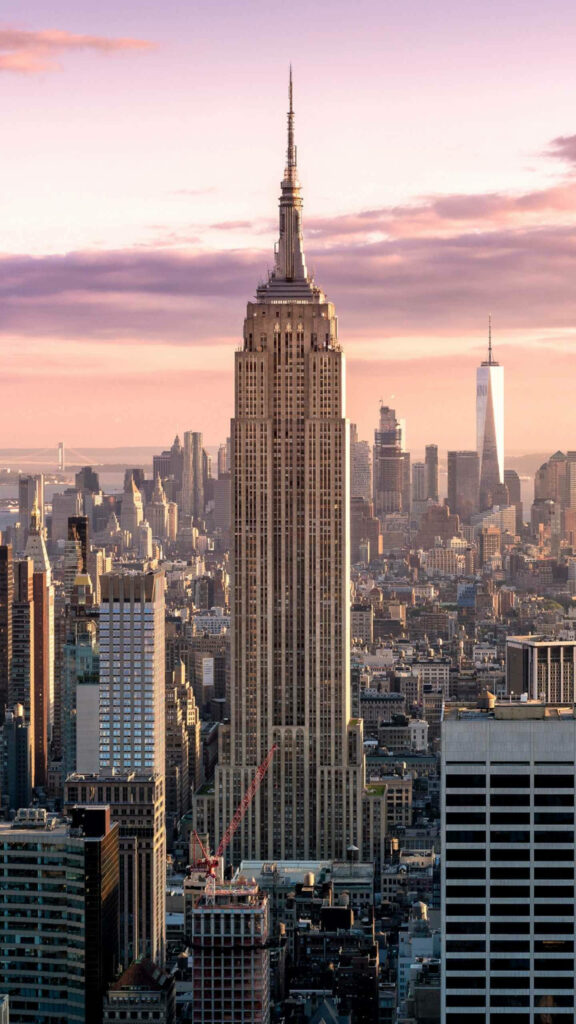 Glorious Golden Majesty: Captivating Cityscape of New York's Empire State Building Wallpaper