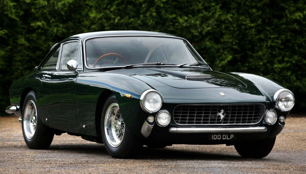 Captivating Backdrop: Exquisite Ferrari 330 GT Lusso With Striking Fog Lights Posing For a Spectacular Desktop Wallpaper