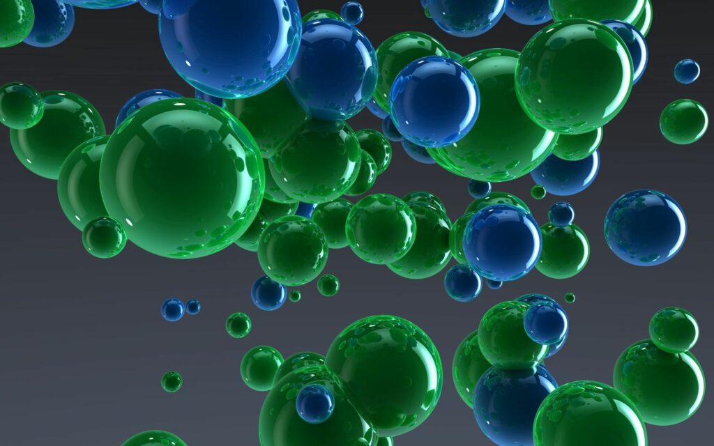 Glossy Blue & Green Spheres on Dark Gradient Background Wallpaper