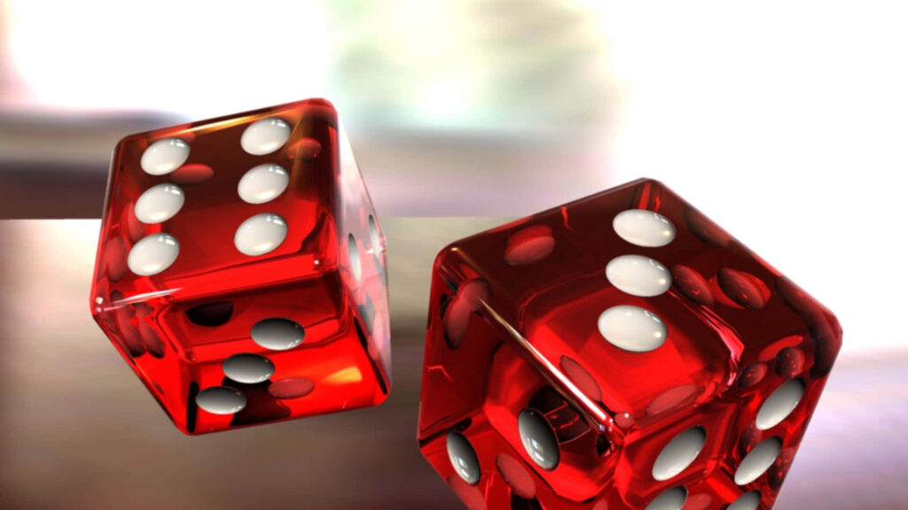 Glossy red dice with white dots on blurred background modern gaming wallpaper background