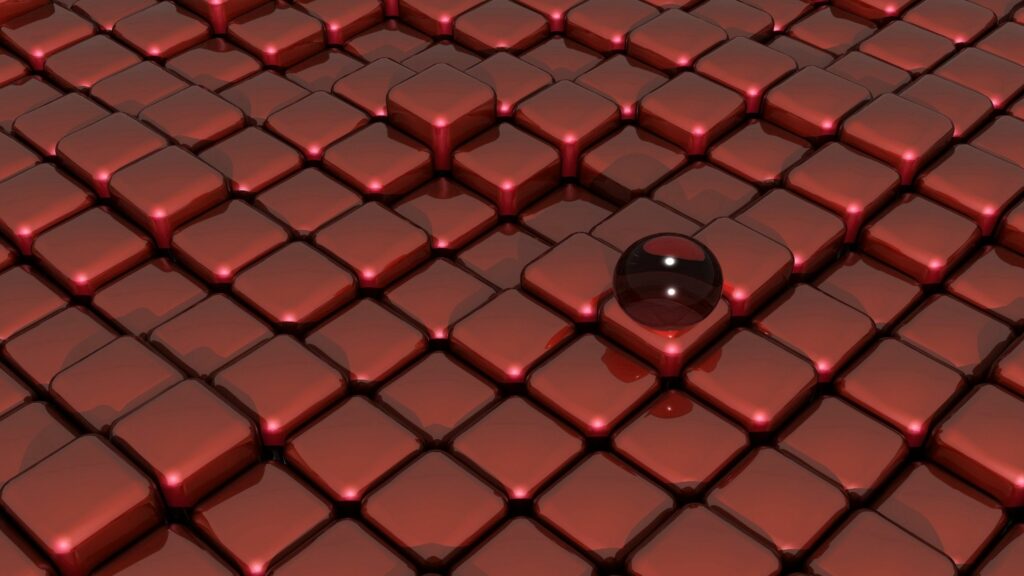 Stylish Red Plastic Cube Wallpaper with Reflective Glass Ball