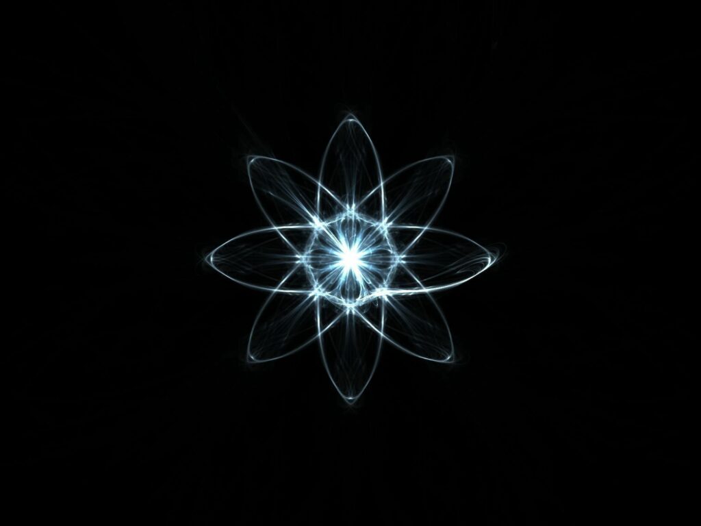 Glowing Atomic Abstract Wallpaper on Dark Background | Energizing Design