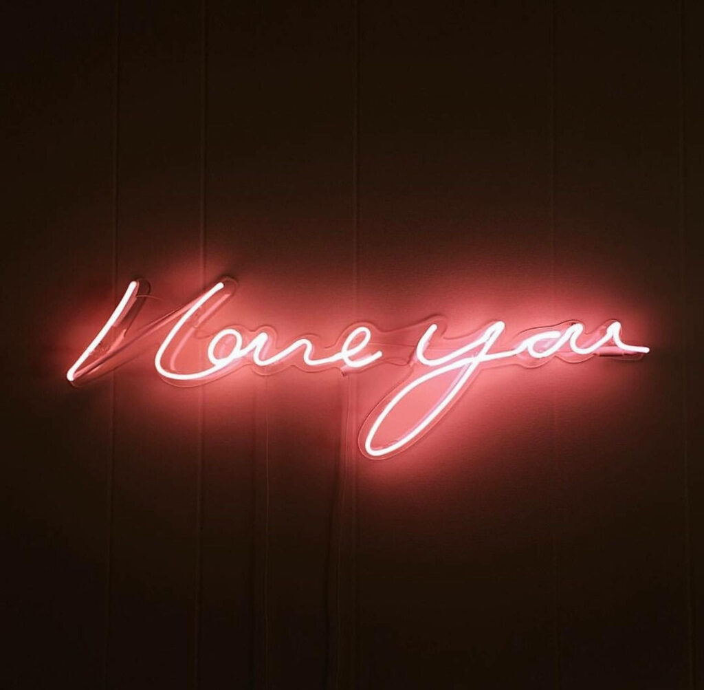 Lighting Up Love: A Stunning Red Neon Wallpaper to Brighten Up Your Space