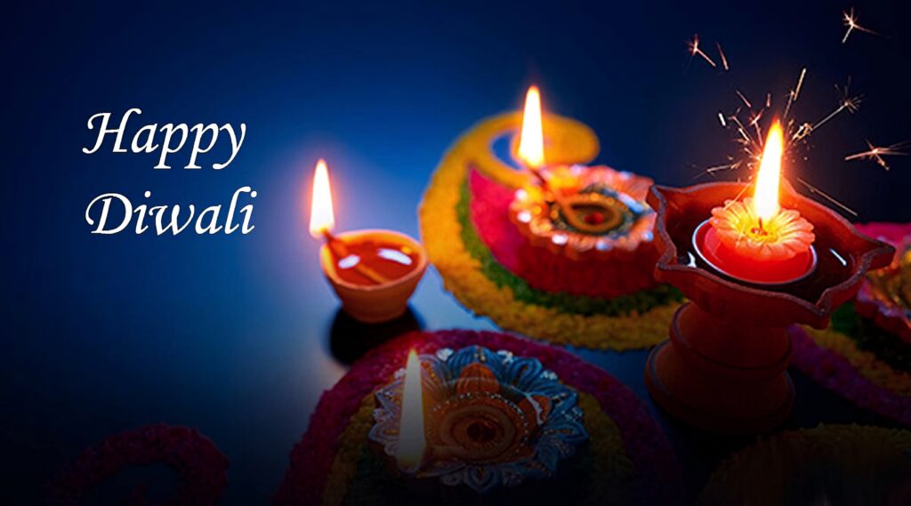 Vibrant glowing blue Diwali wallpaper with traditional oil lamps and colorful rangoli design