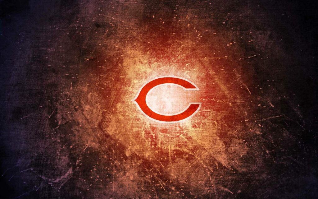 Glowing Chicago Bears logo on vibrant grunge orange and purple textured wallpaper background